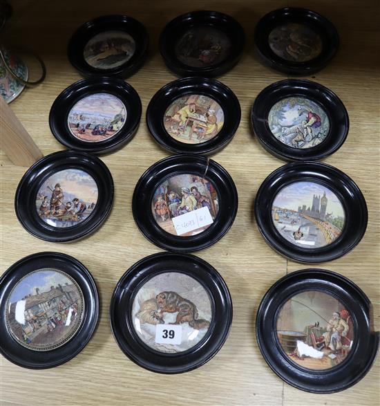 A collection of twelve Victorian Prattware pot lids, framed